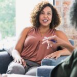 A business coach speaking with a client
