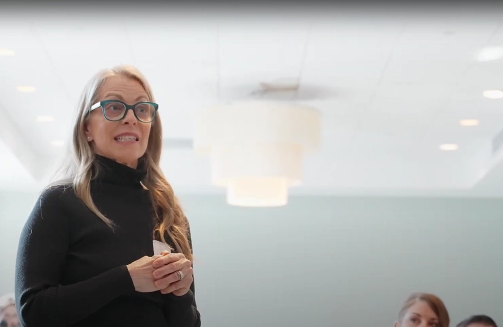 Nancy Burger speaking at a coaching workshop