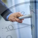 A person opening a door
